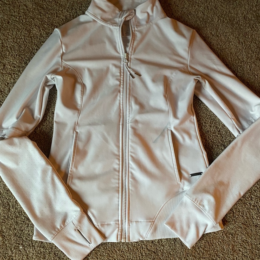white small jacket good for workouts, wearing under clothes.